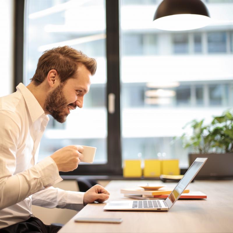 man with beard learning digital skills with Grow Digital Cornwall